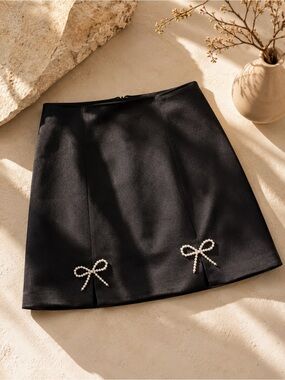 Anthropologie/ Avec Les Filles Velvet Bow Black Mini Skirt size Small